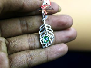 "Krishna Peacock Feather Pendant – Symbol of Purity, Blessings & Divine Energy | Jewelyaari"